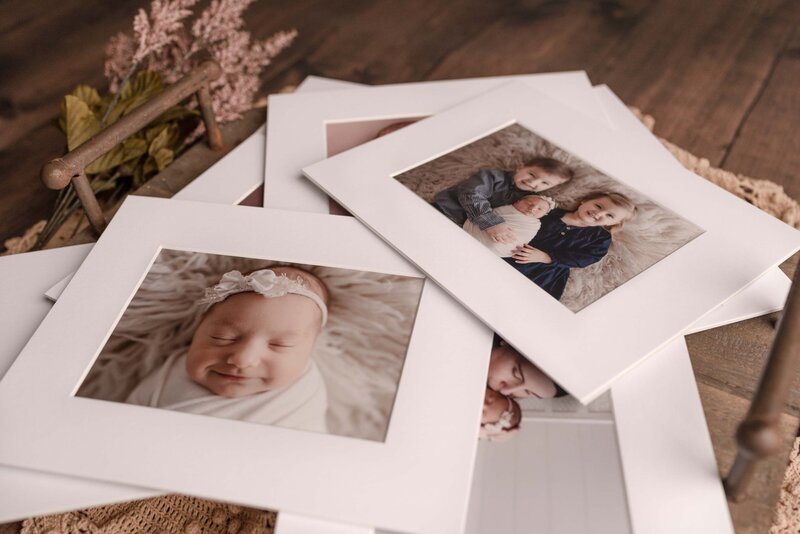 White Framed Pictures of Newborn