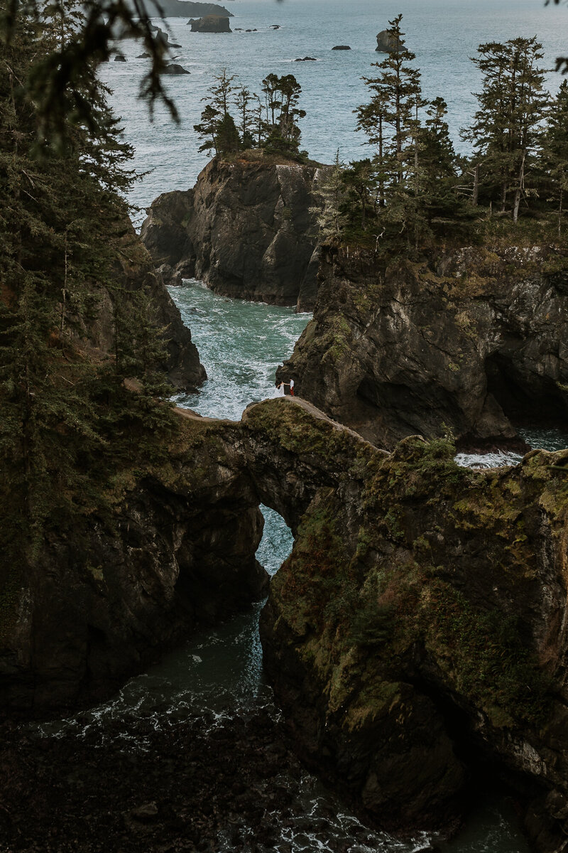 couple celebrates wedding at Natural Bridges on the Oregon Coast