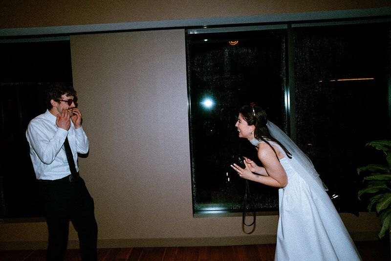 bride and groom walking in Salem athenaeum garden