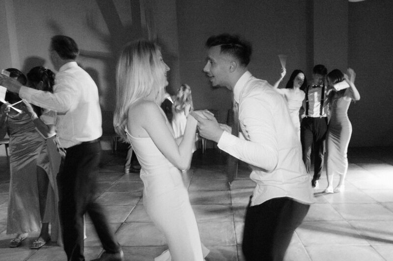 Luxury wedding in Europe – sophisticated bride in a modern wedding gown and groom in a timeless suit.
