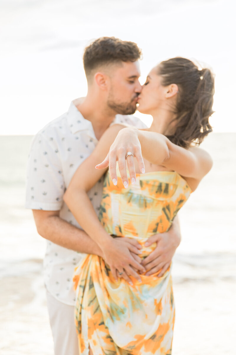 Maui Surprise Proposal Photographer showing off ring during photoshoot