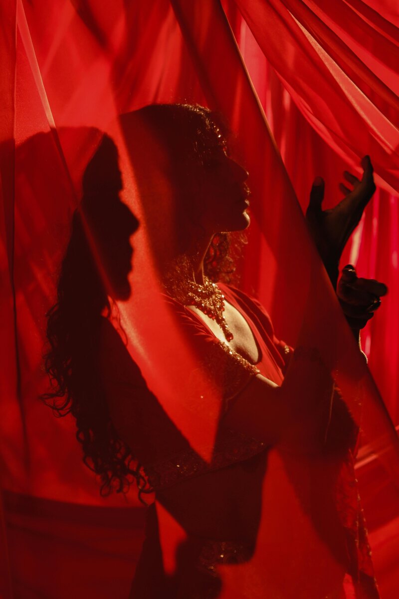 Indian woman wearing traditional red attire