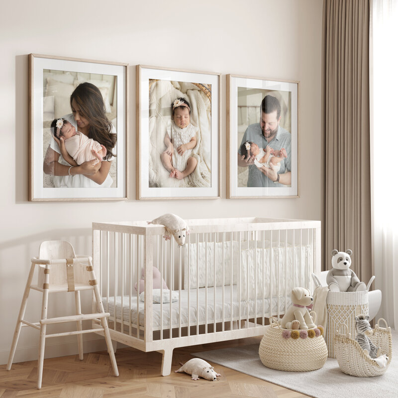 Wall art framed photos of newborn studio portraits in nursery cleveland family photographer