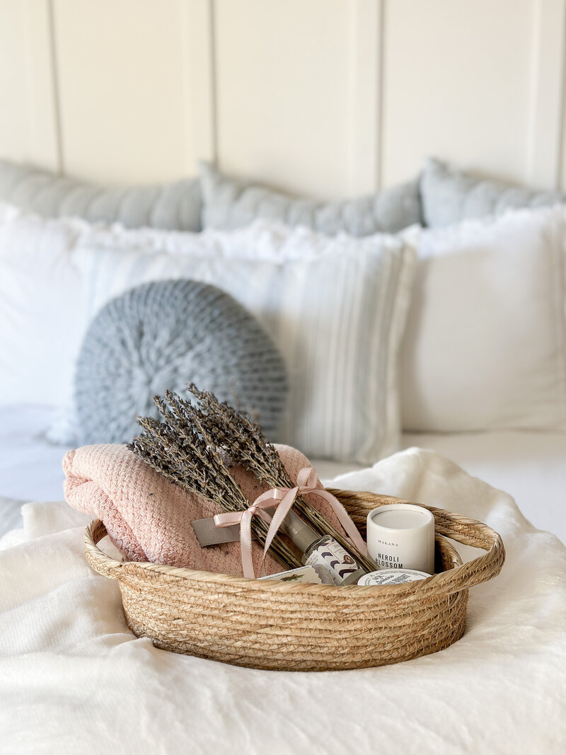TJ’s bedroom basket on bed 