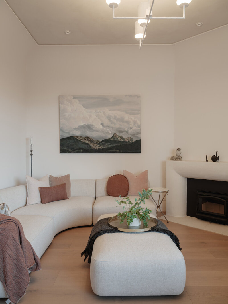 Timber Cladded house with a curved window and an outdoor shower