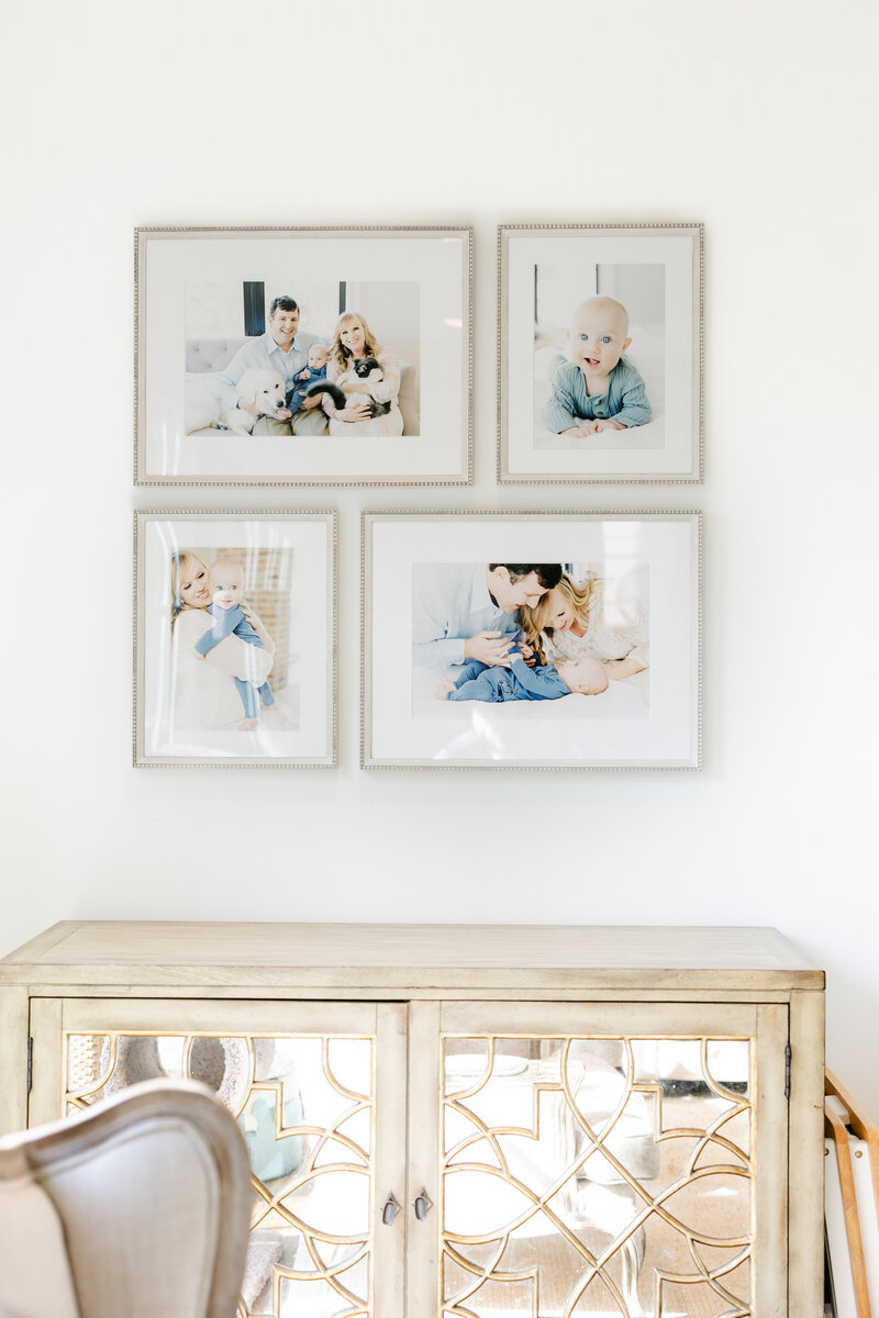framed gallery wall over buffet table
