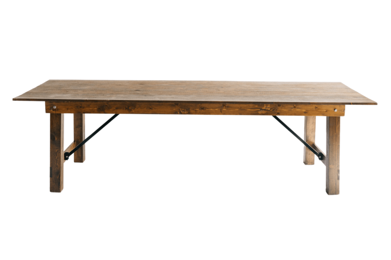 Product image of a rectangular wooden farmhouse table with sturdy legs and warm brown finish, available for event rentals.