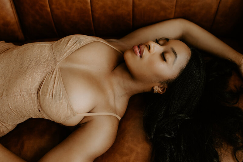 woman laying on a bed