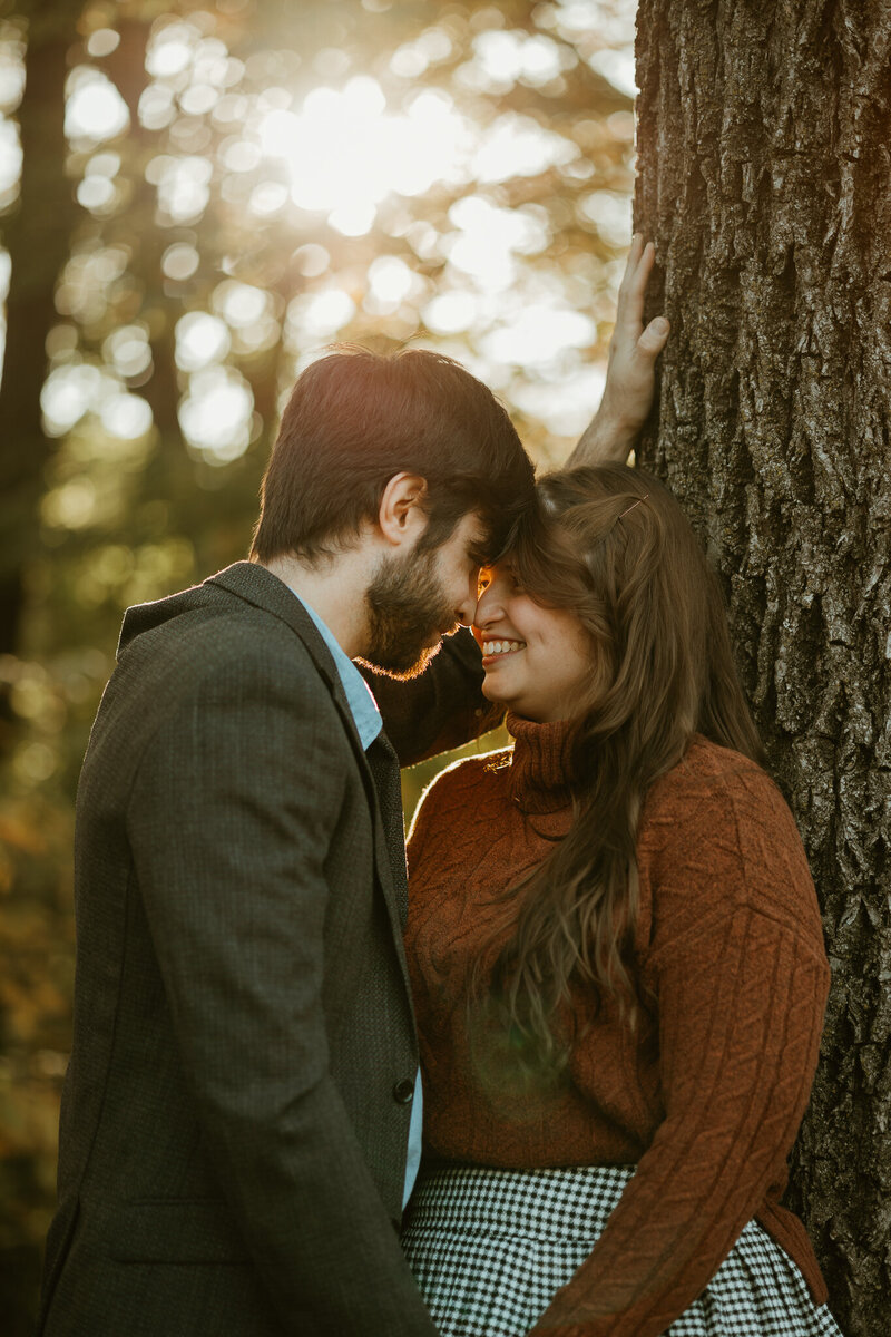 Couple shares intimate moment during golden hour at Lockridge park in Alburtis PA 