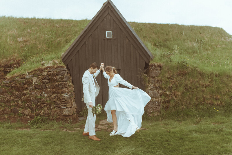 A couple during their elopement in Iceland, surrounded by dramatic landscapes and adventure.