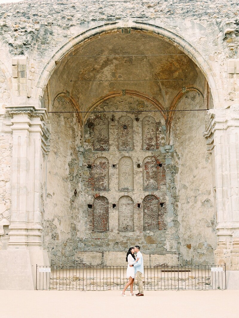 Engagement session at Mission San Juan Capistrano, California, by Lisa Riley Photography.