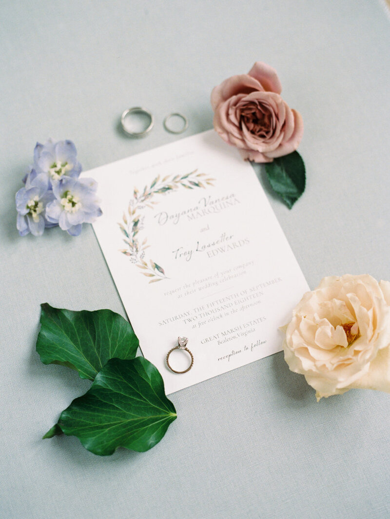 wedding invitation with floral accent by liz theal designs