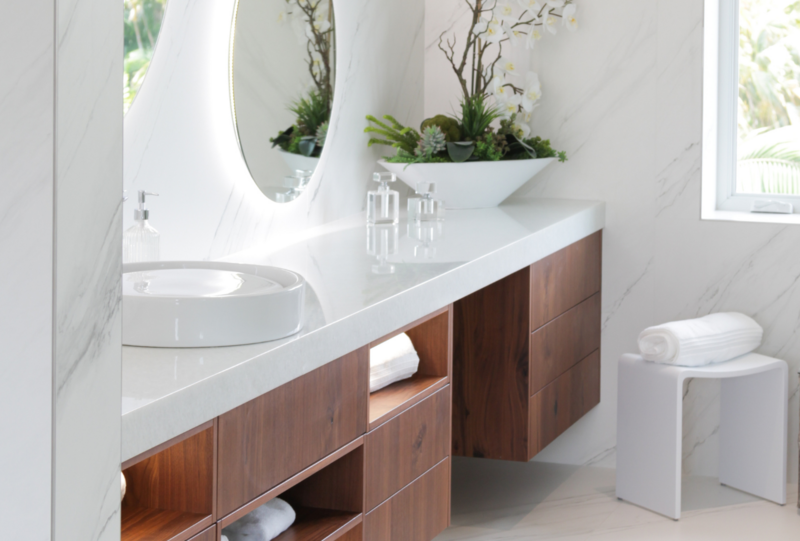 Airy bathroom with marble walls and walnut vanities led wall mirrors - Atlanta Georgia - The Holistic Design Method - Michael Schluetter - Consilium B