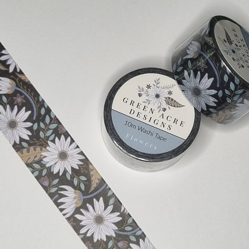 Add a botanical flourish to your next project with this elegant daisy washi tape, showcasing hand-illustrated flowers in a soft, natural palette. Whether you're embellishing journal pages, crafting handmade cards, or packaging a special gift, this decorative tape offers both charm and quality. Designed for artists, paper crafters, and lovers of floral stationery, it brings a timeless touch to everyday creativity.