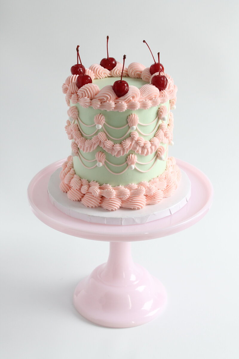 Green and Pink Lambeth Cake with Cherries Crown