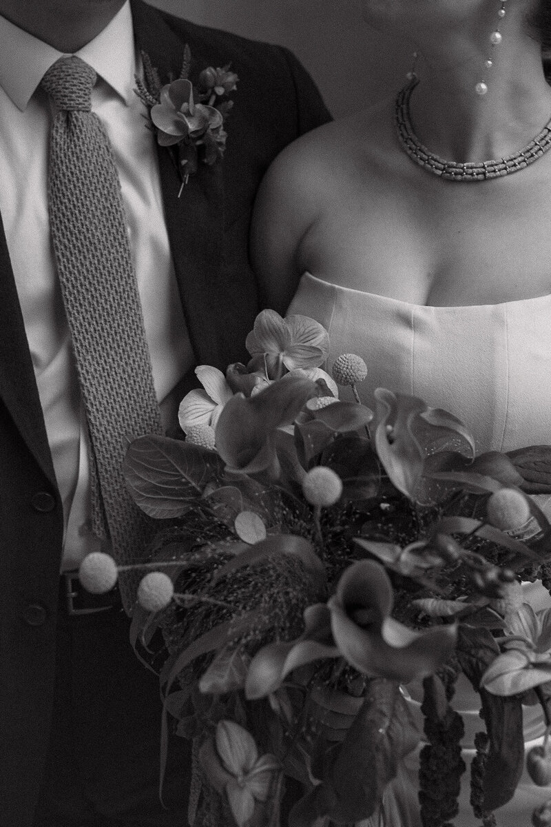 Jessica and Francis walk the streets of central London after their wedding ceremony at The old Marylebone town hall in central London
