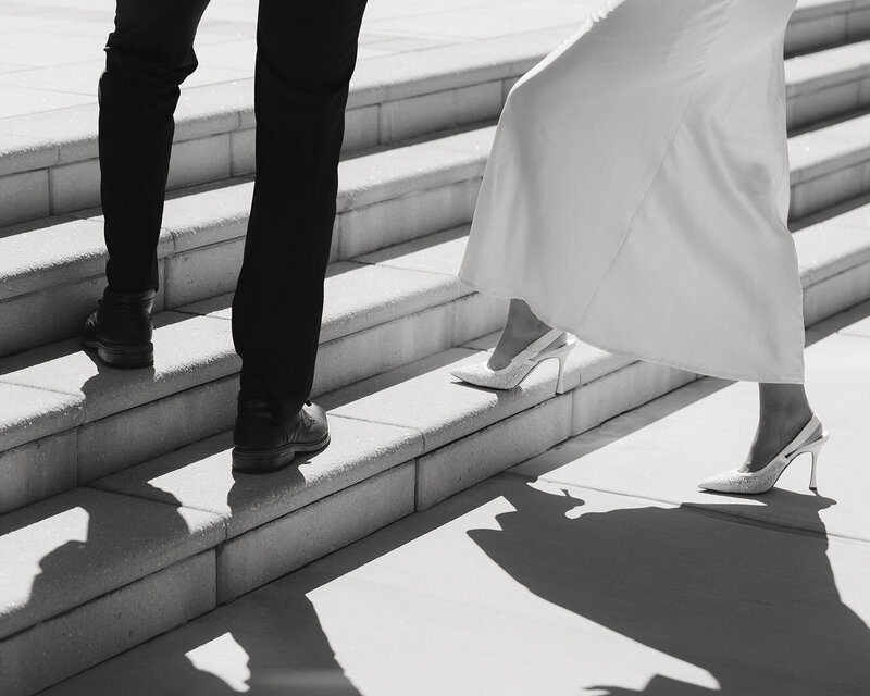 man and woman wearing sneakers