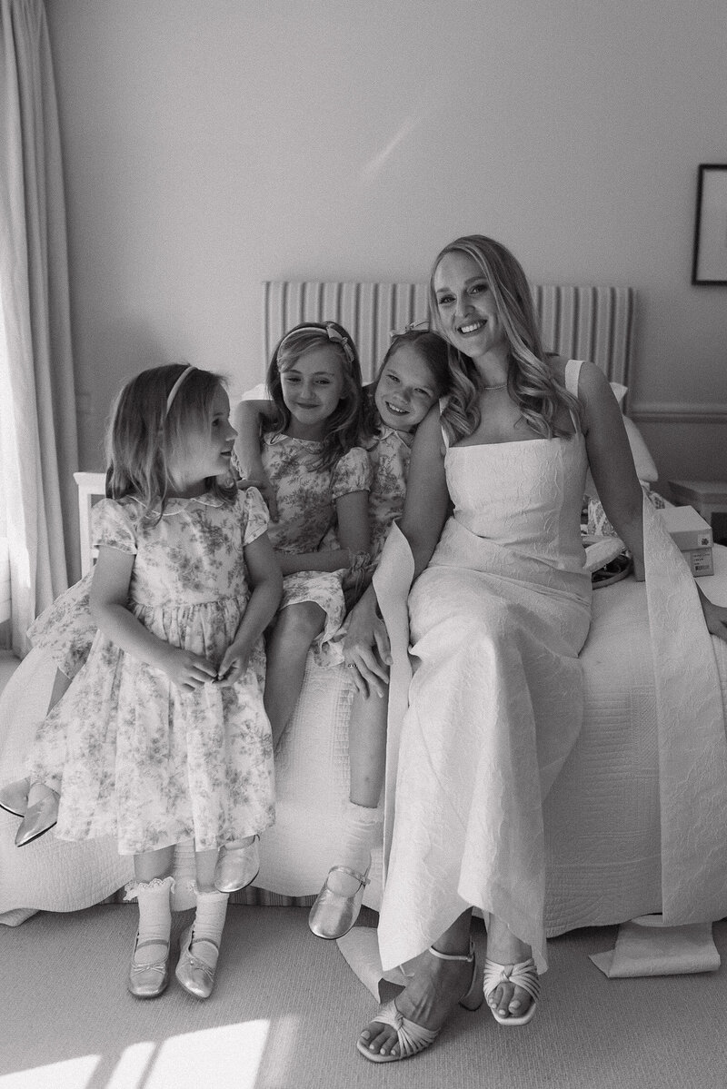 Wedding photographer captures couple taking a stroll hand in hand at their french chateau wedding.