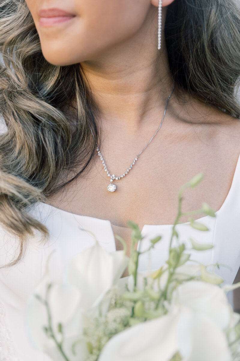 Close up of bride’s jewelry at The Willard in DC on wedding day