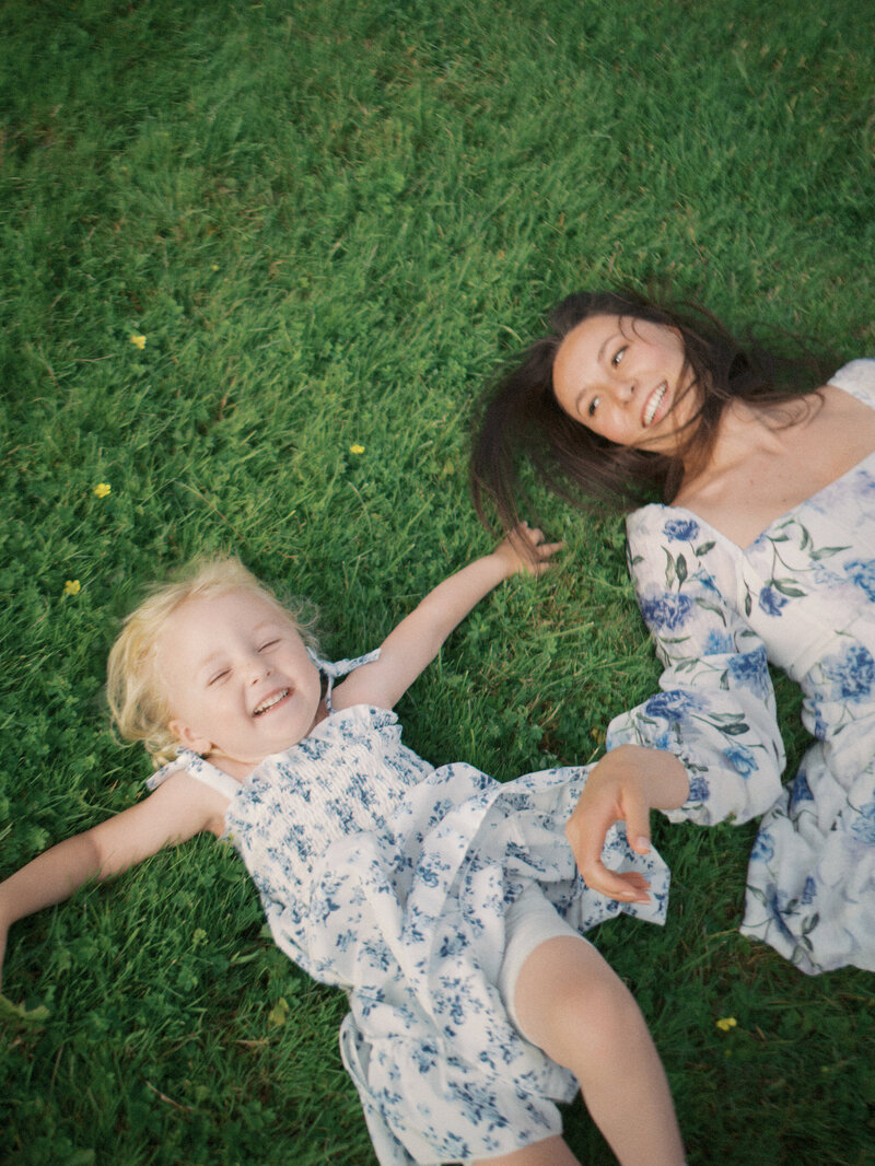 Mother and daughter sitting next to each other at a studio in Vancouver