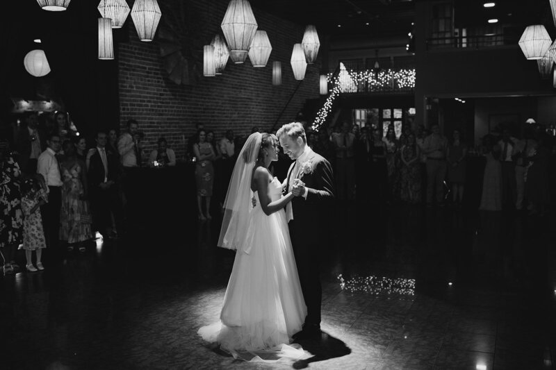 Relive the magic of the bride and groom's first dance under lantern lighting, creating an intimate and unforgettable moment. See more romantic wedding dances.