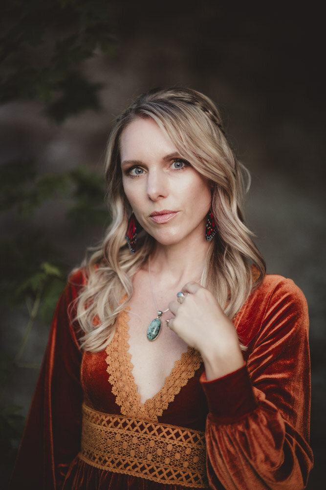 Caroline Weiss in nature, representing healing energy, soul alignment, and mindfulness.