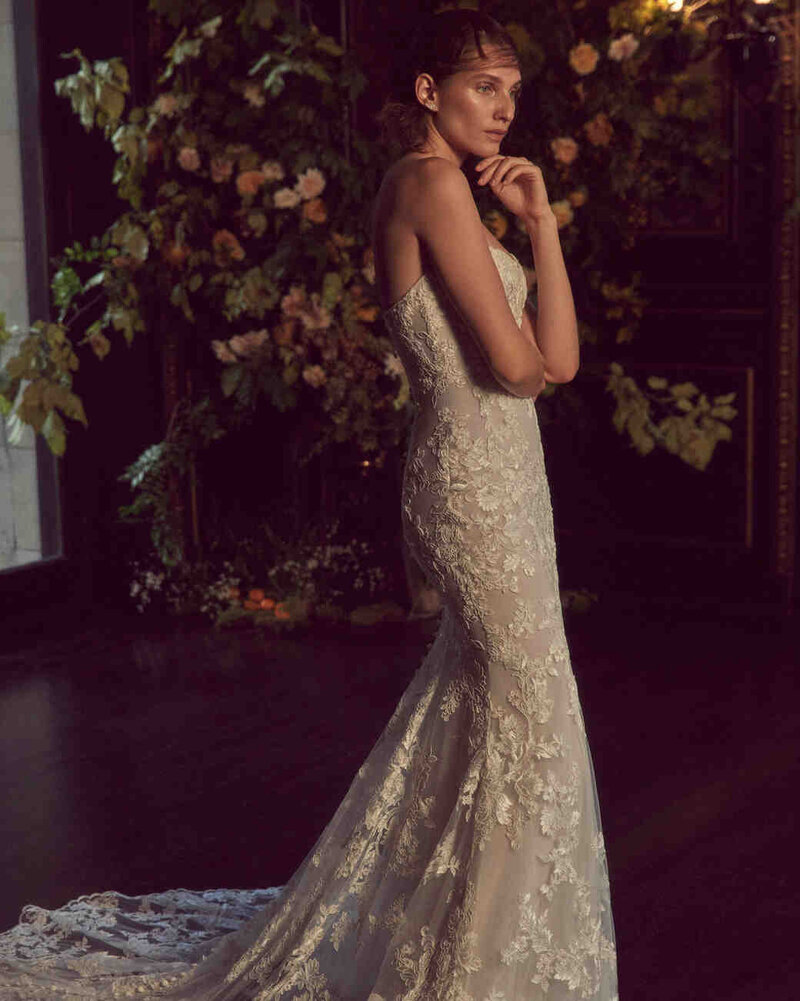 Halter neck sheath with draped skirt, peek-a-boo bodice