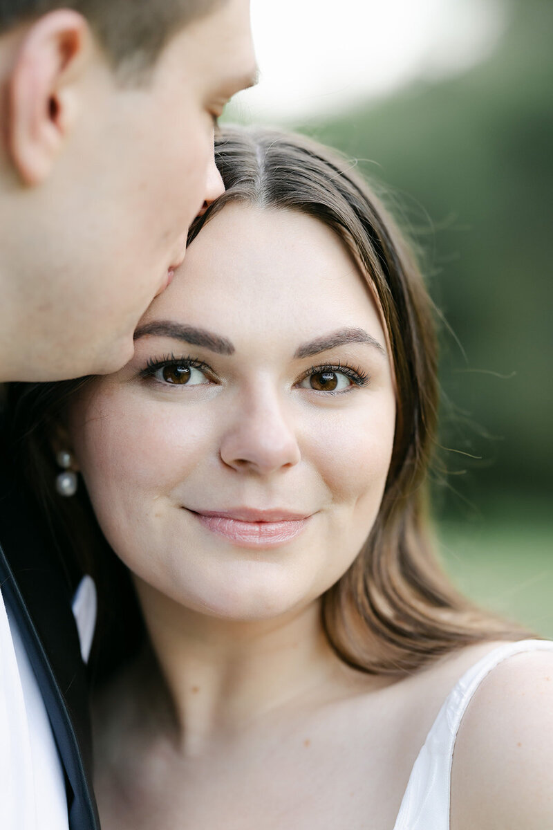 groom-kisses-bride-middletown-ct
