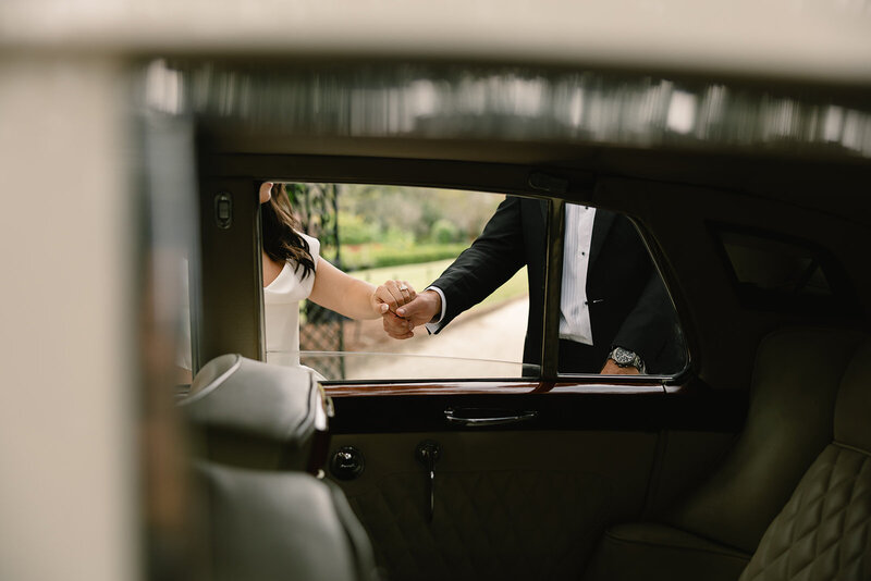 Couple sharing a romantic first dance under string lights at Hotel Domestique wedding venue near Greenville, SC