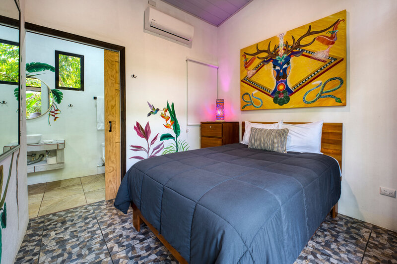 Lotus and Madre Tierra Rooms - Each with 1 full size bed and together a shared bathroom  (4)