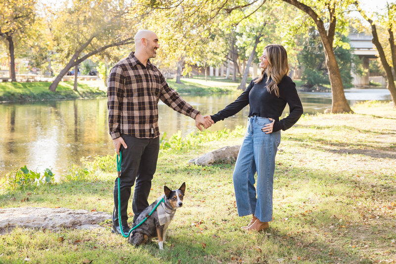 couple looking at each other by the river