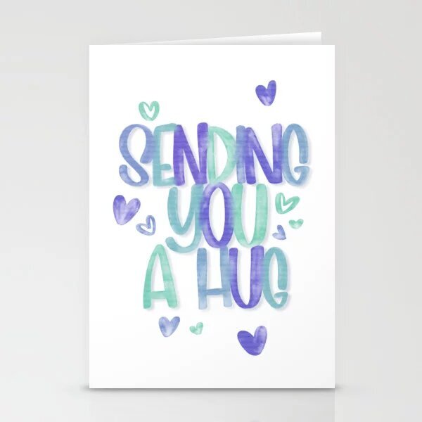 Custom hand lettered greeting card with text "sending you a hug"
