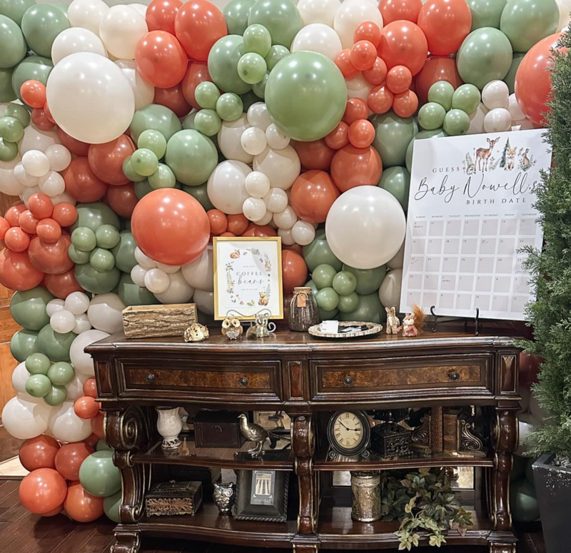 custom balloons for baby shower - green, cream, orange, gender neutral