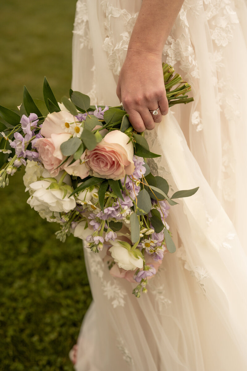 photo of a bride holding her wedding bouquet in idaho
