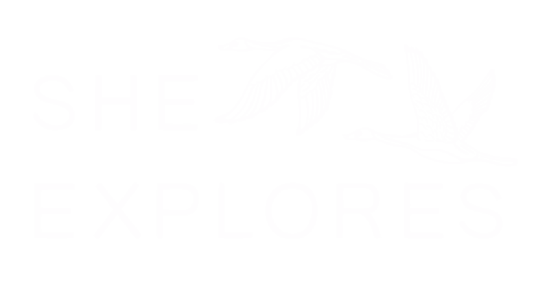 she explores logo