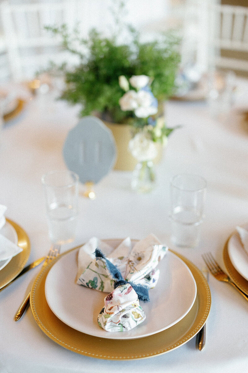 Reception decor in Canyonwood Ridge hall with romantic lighting and Hill Country details