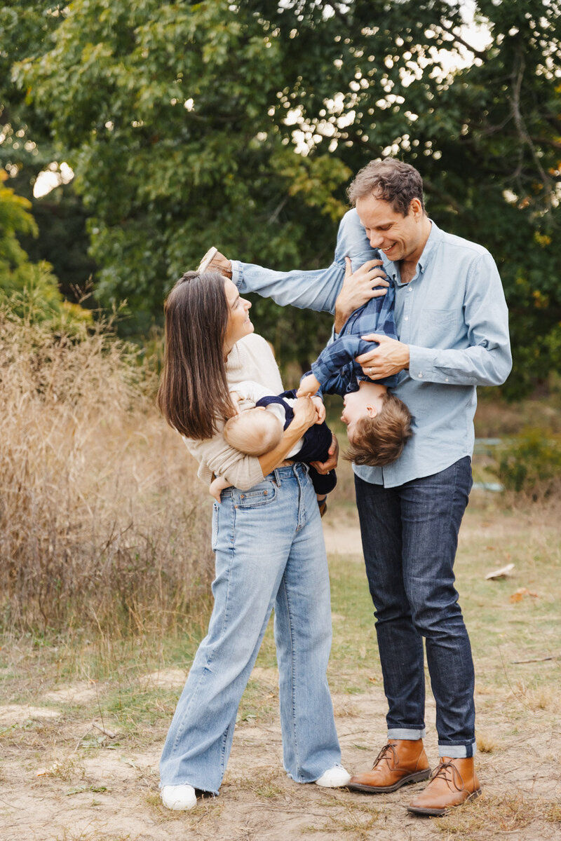 Family of 4 enjoying a warm fall evening in HIgh Park Toronto