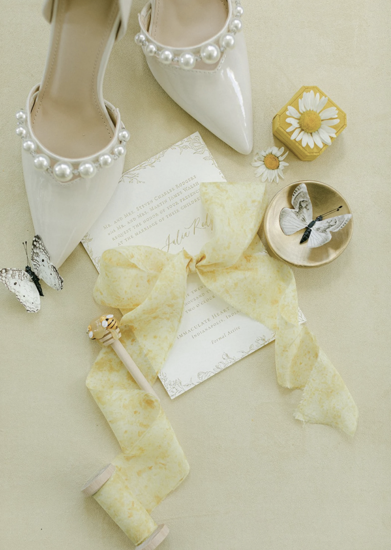 Yellow suede styling mat for cheerful wedding flat lays with pastel accents