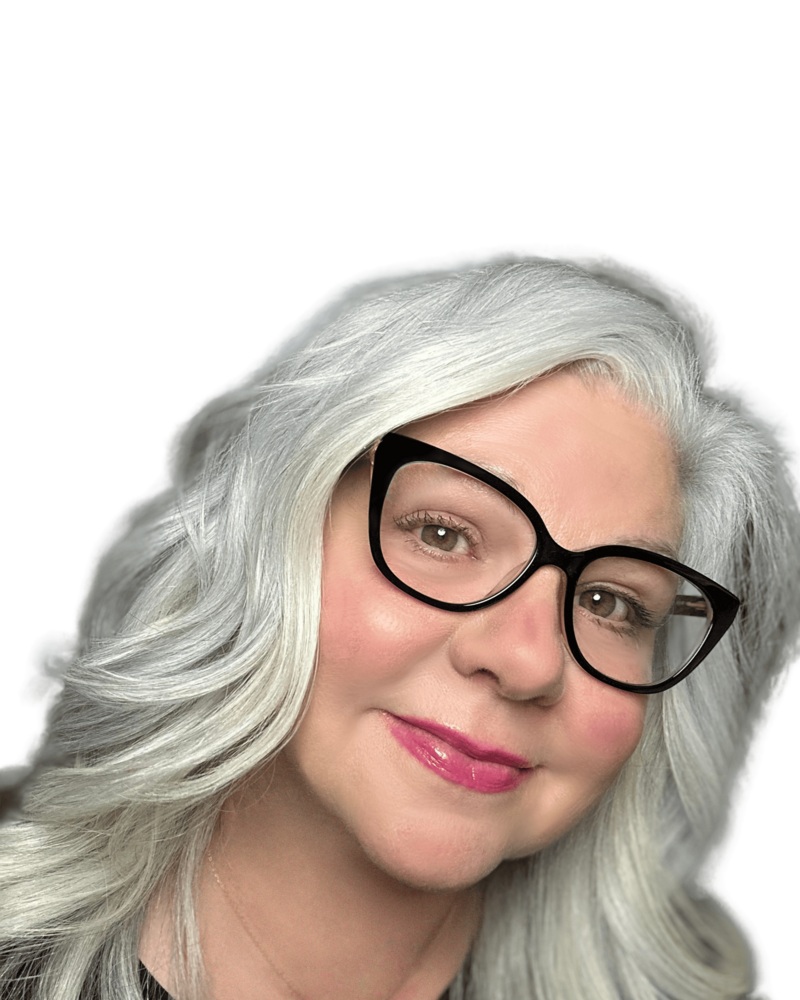 CHRISTI BALFOUR IN A BLACK TURTLENECK WITH HER GRAY HAIR DOWN