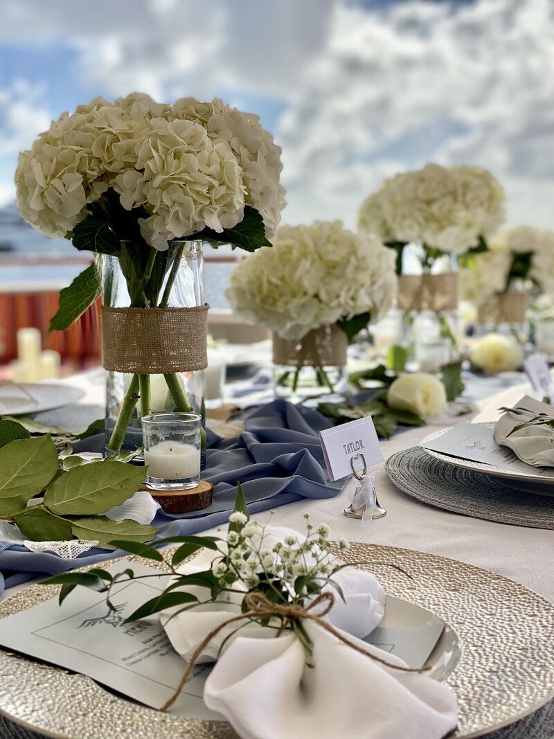 Wedding table setting with white hydrangea flowers