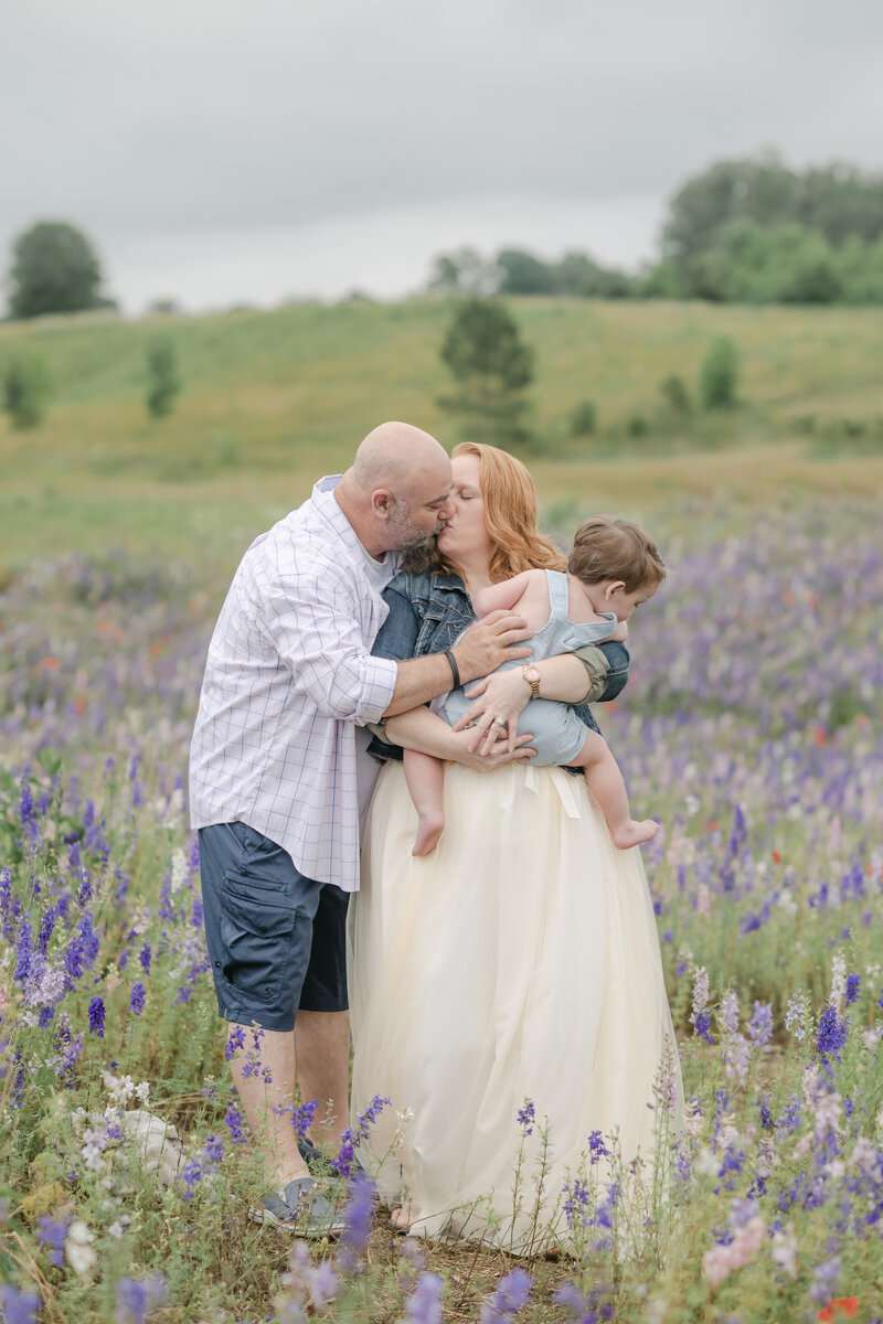 Children running in bluebells with professional photographer in Winston-Salem Emily Richardson