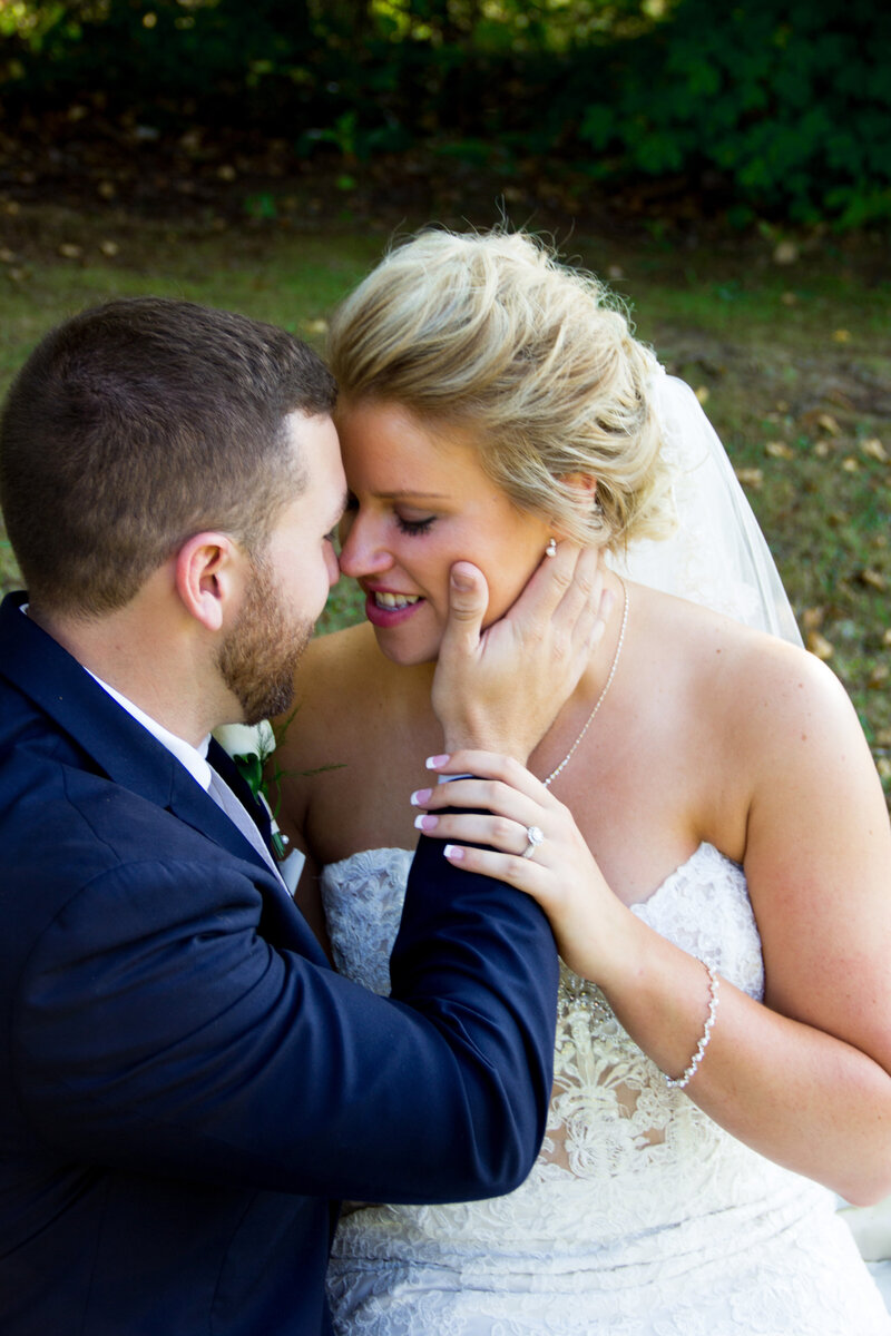 Bride and Groom with heads together | Sugarloaf Maine Wedding Photography