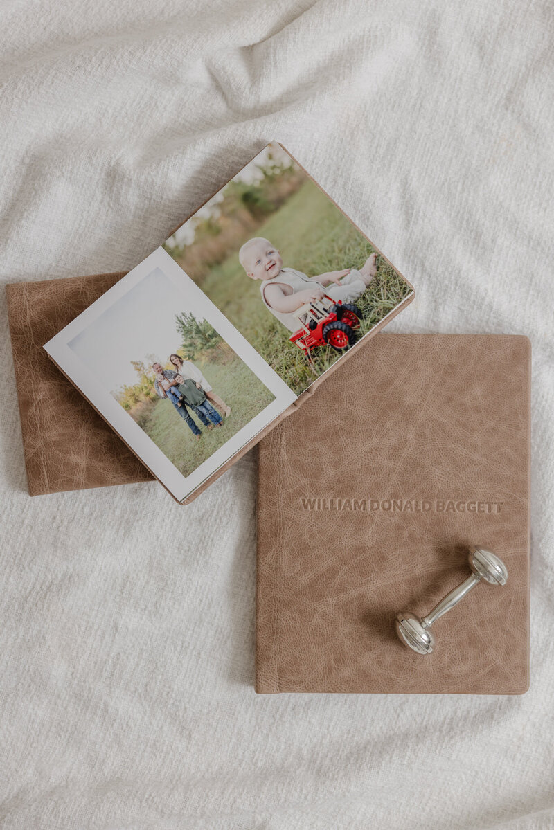 Mockup of Four Frames on a wall of newborn photography in Greenville SC
