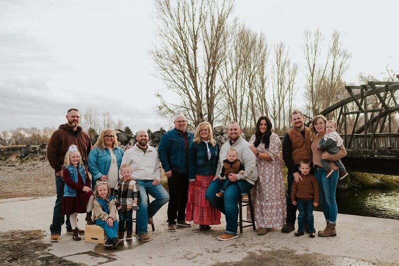 young family posing for their Idaho family photographer
