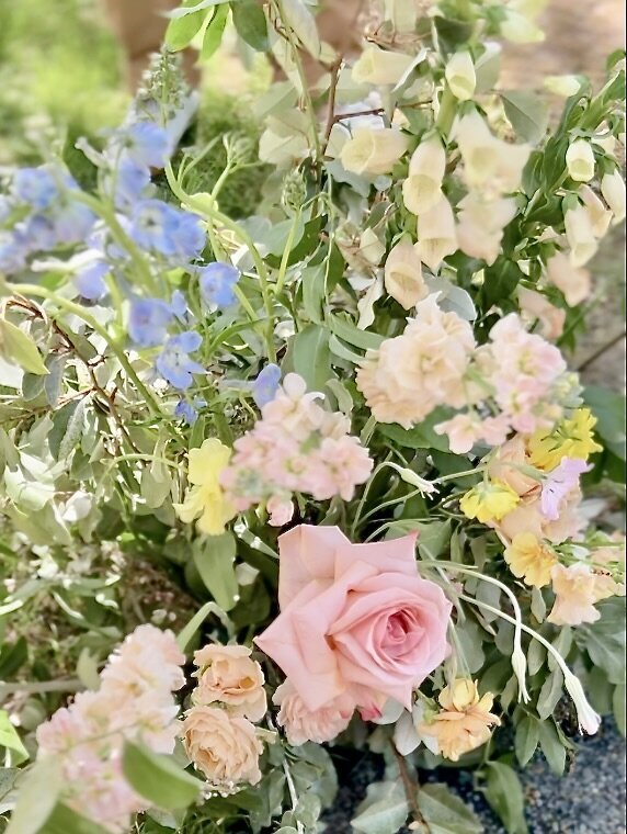pastel wedding flowers `captured by a wedding day content creator