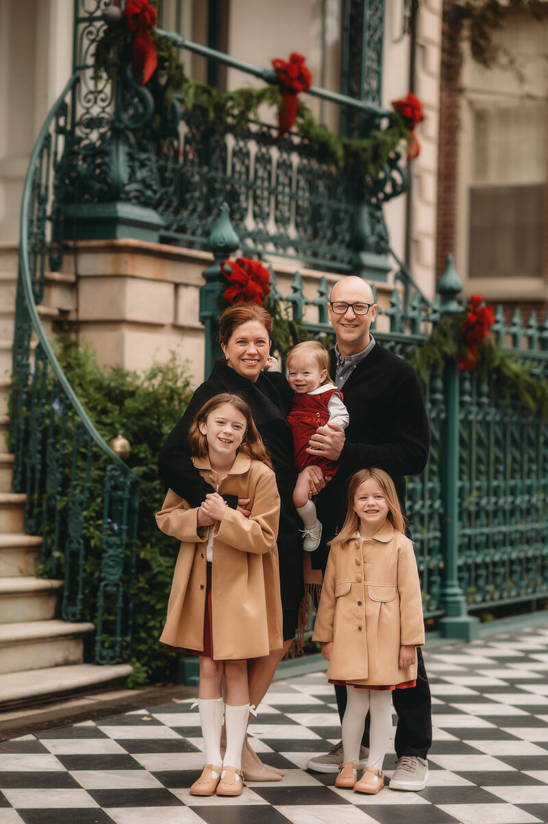 Family poses for Holiday Photos in Charleston, South Carolina.