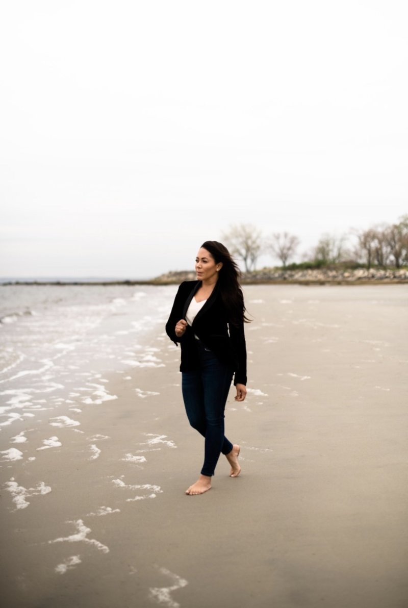 Woman walking on the beach