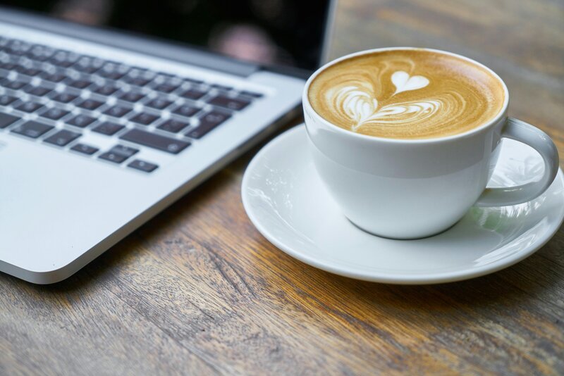 Coffee and computer keyboard