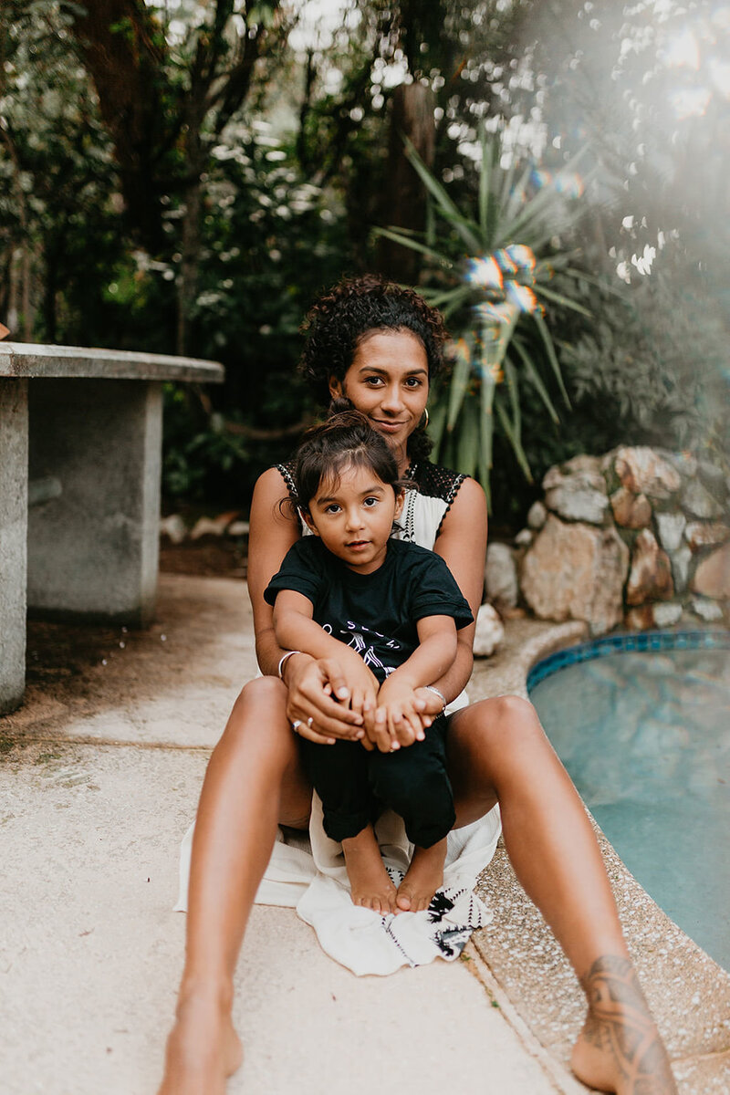 mom sitting with child