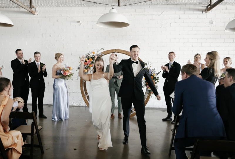 groom kissing bride's cheek